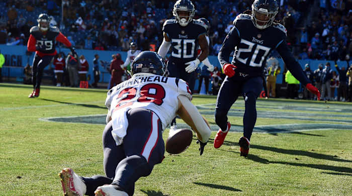 Texans running back Rex Burkhead fumbles near the end zone
